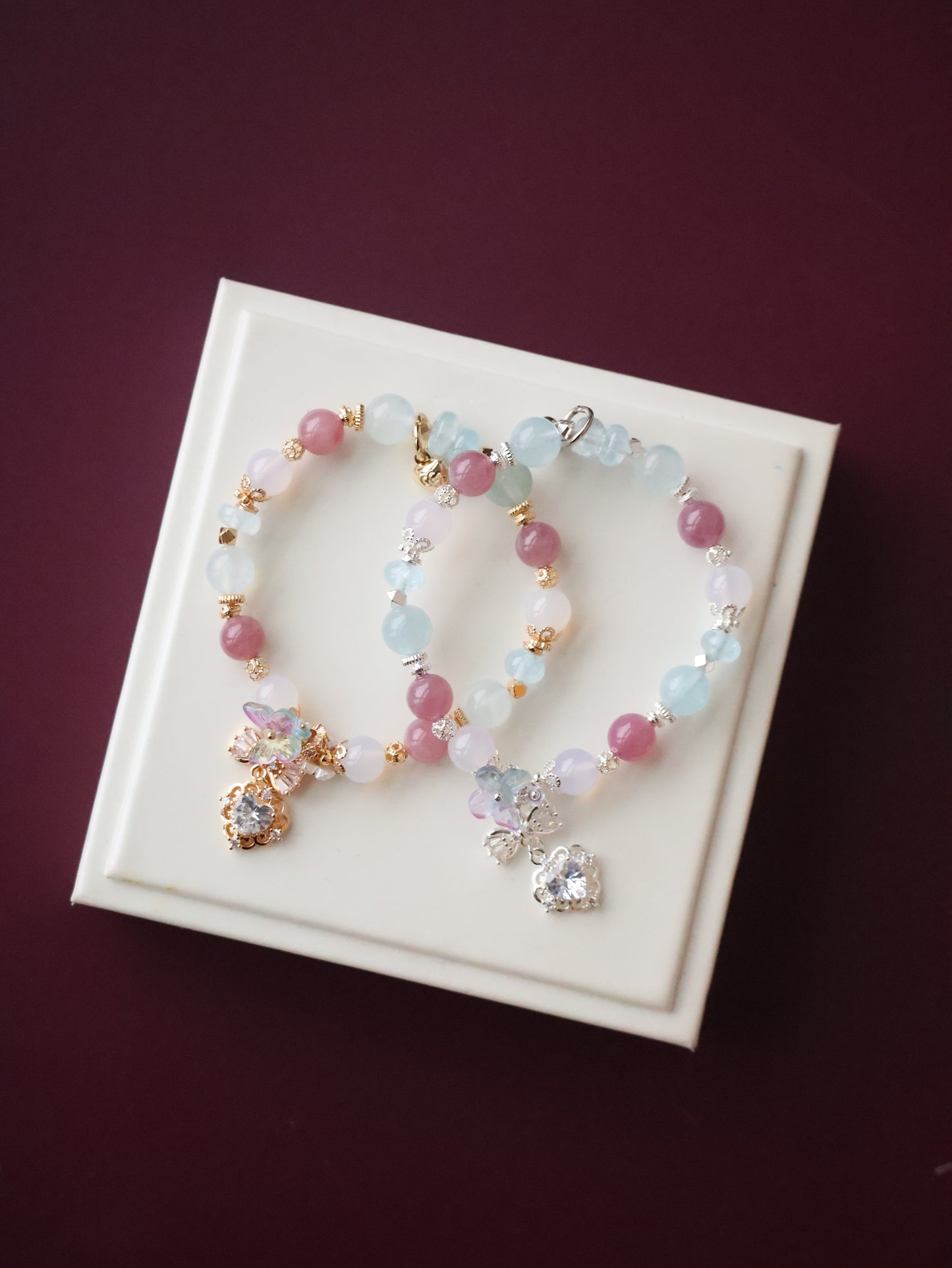 *Instocks*  -  Blossara - 8mm Blue Topaz, Aquamarine, Lilac Chalcedony & Lavender Rose Quartz with Dangly Sparkly Heart and Butterfly Rainbow Charm (Elastic)