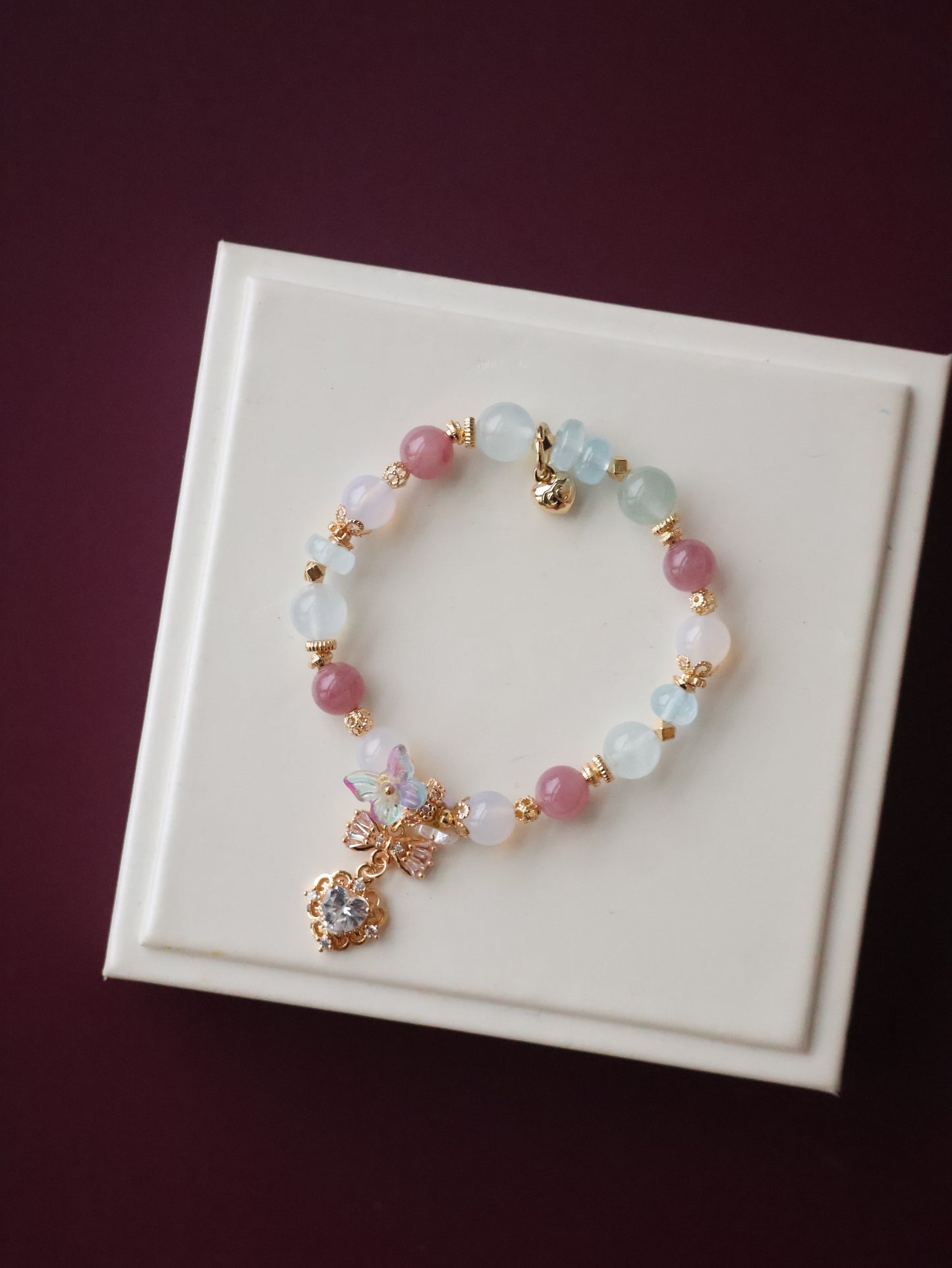*Instocks*  -  Blossara - 8mm Blue Topaz, Aquamarine, Lilac Chalcedony & Lavender Rose Quartz with Dangly Sparkly Heart and Butterfly Rainbow Charm (Elastic)